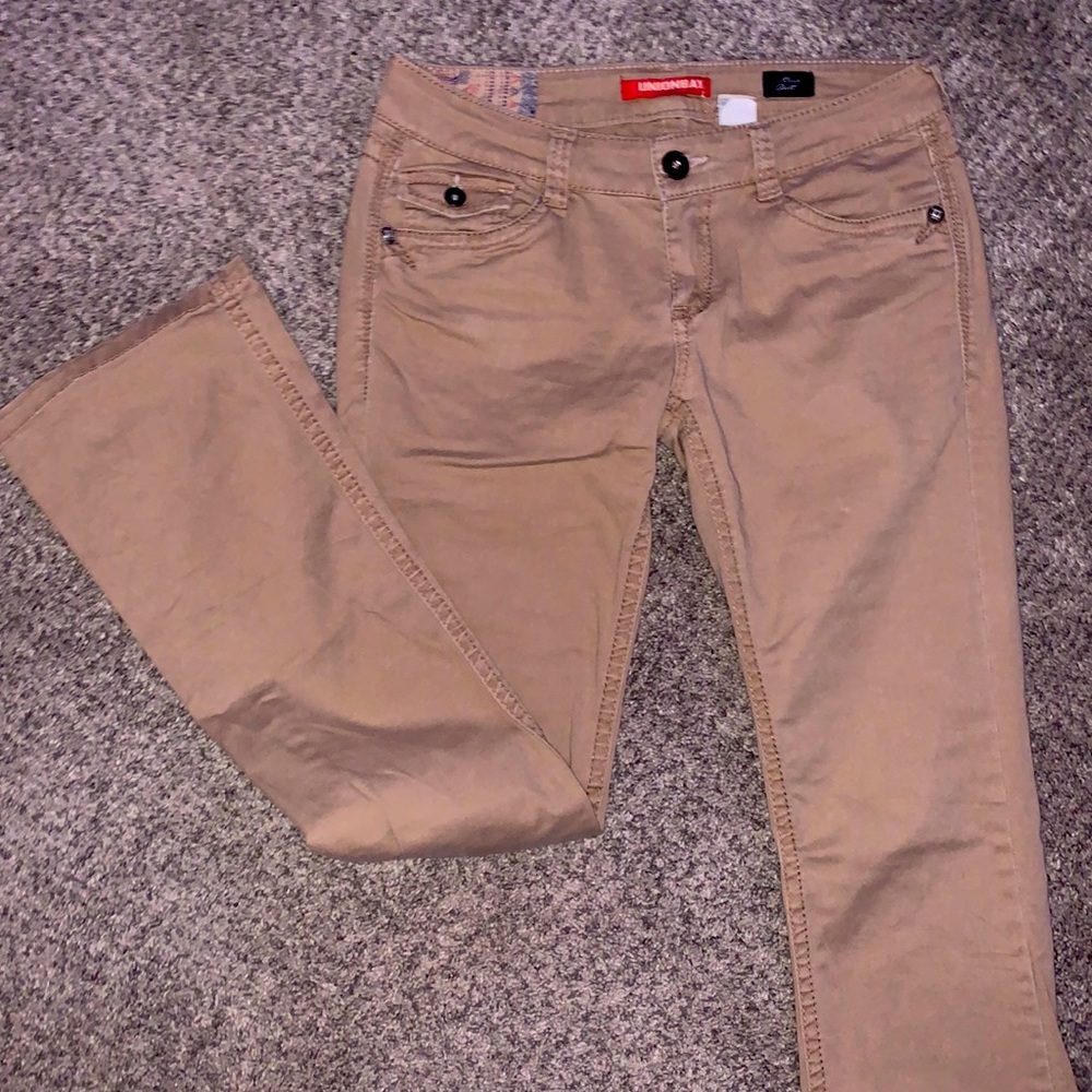 super low-rise tan bootcut jeans